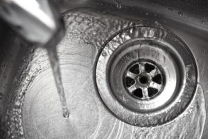 Stainless steel sink plug hole