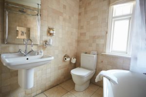 Interior Of Contemporary Bathroom With Tiled Walls