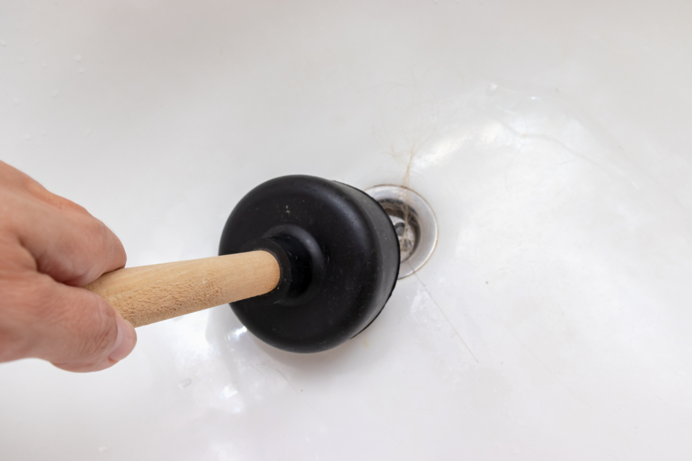 clearing a bathtub clog